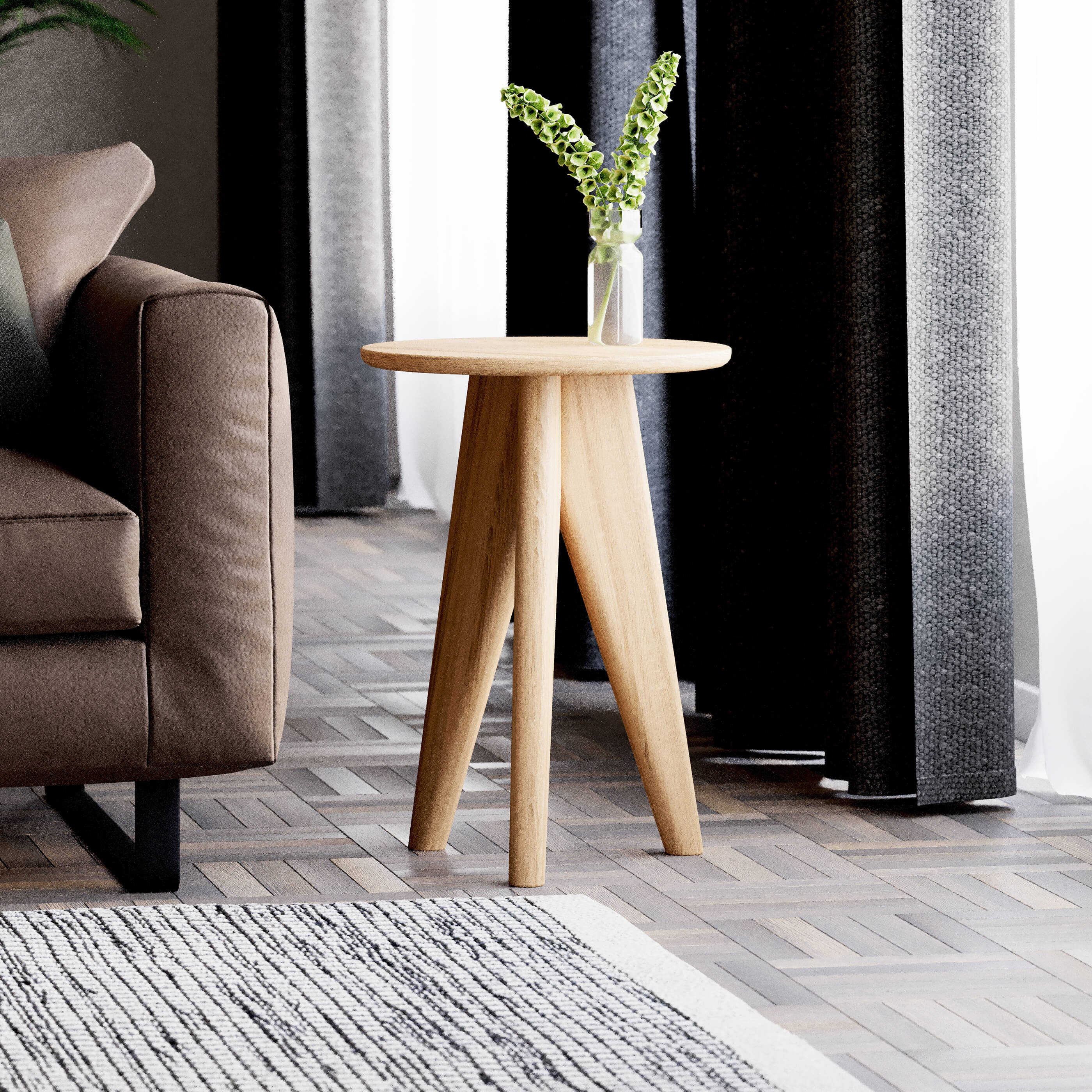 Compact oak side table next to lounge chair – functional and stylish